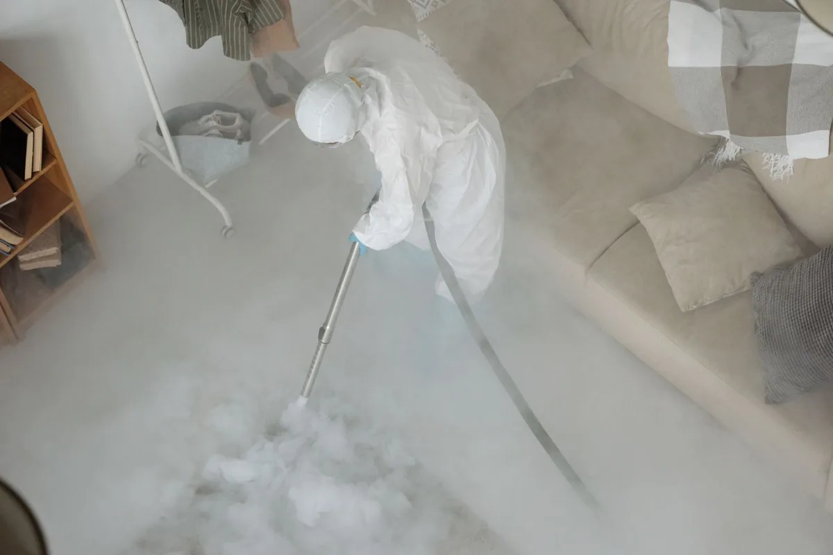 Biohazard cleanup technician in protective equipment, Bedford Hills, NY